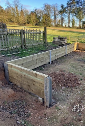 Sleeper retaining wall posts - wall,